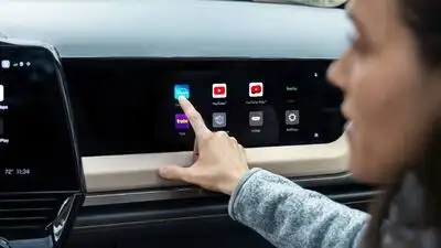 After layoffs and robot push, GM brings back Apple CarPlay: The wider industry impact