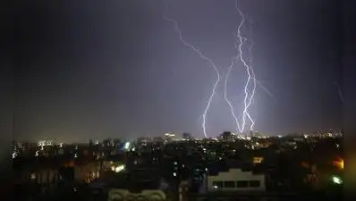 Two people were killed in lightning strikes during a sudden storm in Jalpaiguri district