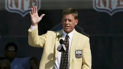 No report cited here argues ESPN is negotiating with McAfee and Manning to replace Aikman