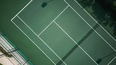 A former Starbucks franchise boss built a tennis court on agricultural land in Hampshire