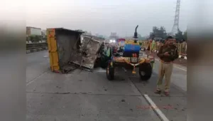 Mangled remains of the truck and the tractor after the crash