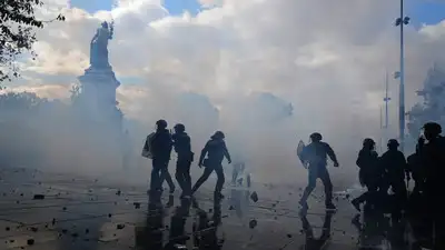 More than 270 people were arrested across France on Saturday as protests over rising living