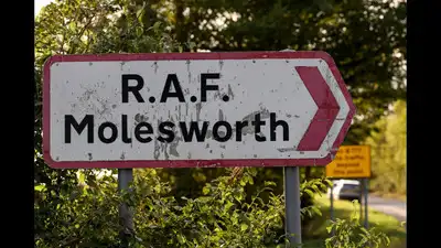 British counter-terrorism police are investigating after two Latvian men were arrested near RAF