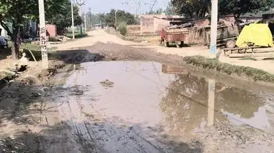 Potholes as deep as 2.5 feet and waterlogging on the Abhaypur-Rithaura road in Bareilly