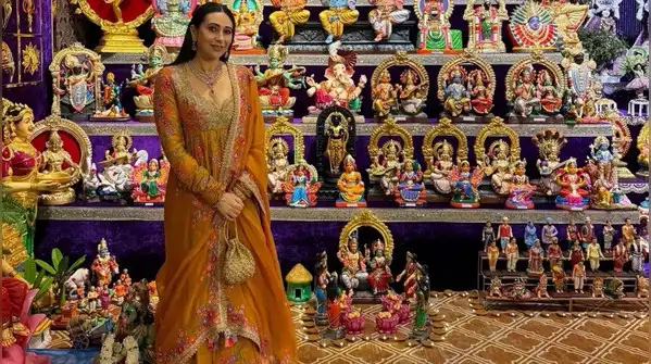 Everyone usually defaults to bright reds, deep maroons, or heavy pinks, but Karisma Kapoor just