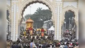 Prashantha wades through a sea of peopleduring the Dasara procession in Mysuru on Wednesday
