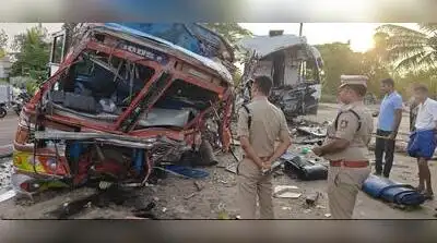 The wrecked bus and truck at the accident site near Kiranahalli village in Periyapatna