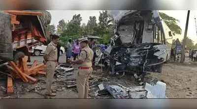 The wrecked bus and truck at the accident site near Kiranahalli village in Periyapatna