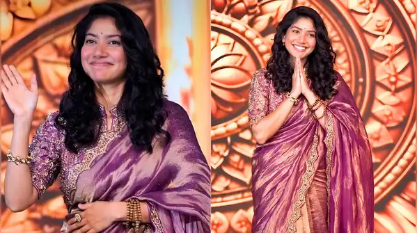 She walked in wearing a rich purple tissue silk saree at the 'Ramayana' Telugu pre-release