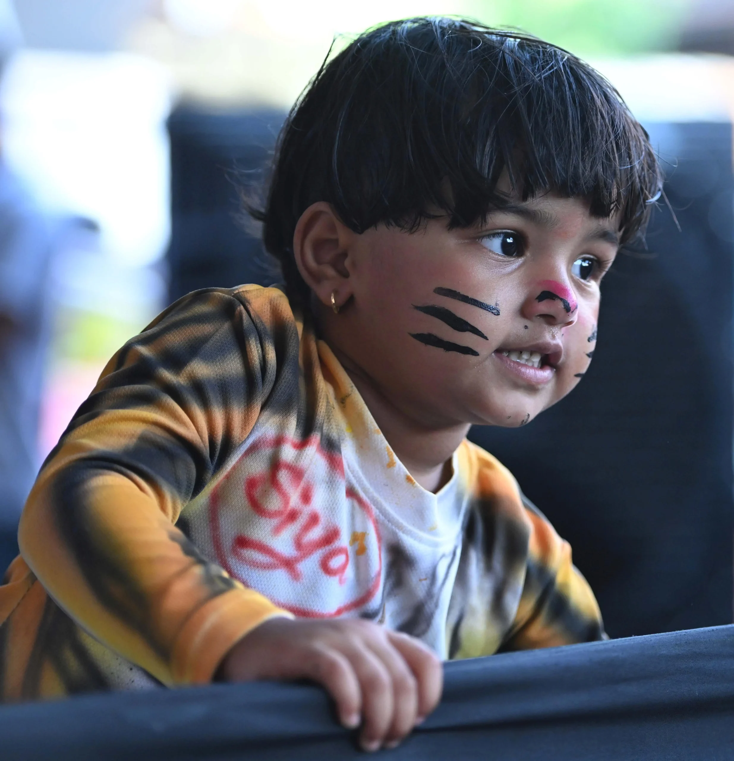 A young participant strikes a pose during a kinni pili competition at Kudroli Sri Gokarnanatha