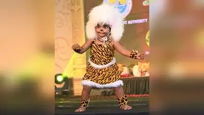 A young participant strikes a pose during a kinni pili competition at Kudroli Sri Gokarnanatha