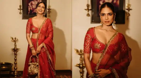 Crimson and gold cannot exactly be classified as shrinking violets, and Malavika Mohanan knows