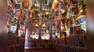 A wall also exhibits posters and inlay cards of Uttam Kumar classics