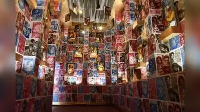 A wall also exhibits posters and inlay cards of Uttam Kumar classics