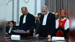 Justice Tadakamalla Vinod Kumar being sworn in as a judge of Telangana high court on Wednesday