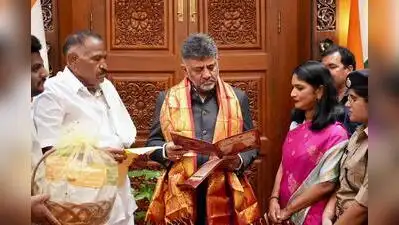 Hassan district minister KM Shivalingegowda with Hassan DC invited CM DK Shivakumar