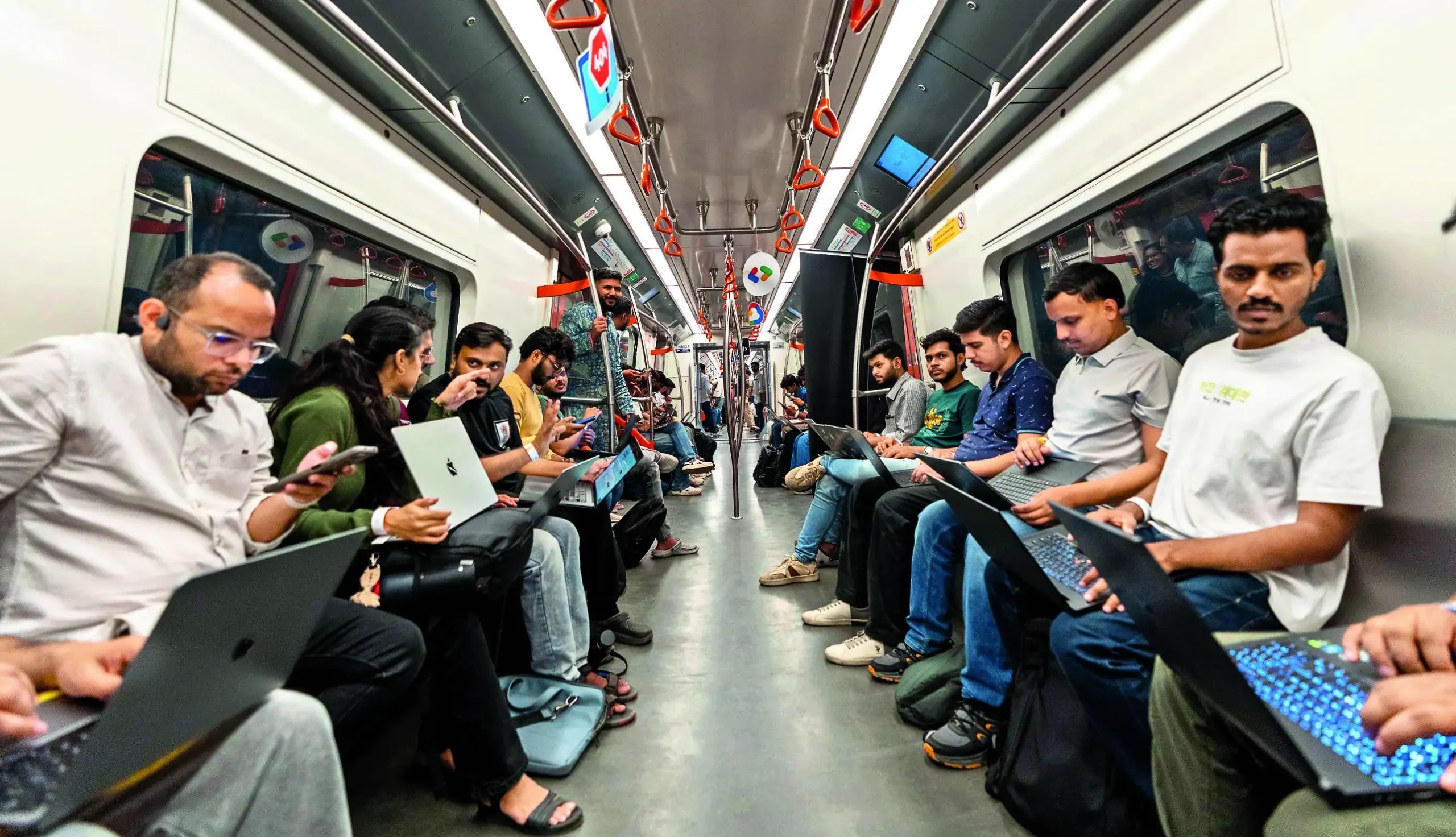 Young volunteers hacked real-world problems on a moving Metro recently Drijesh Patel