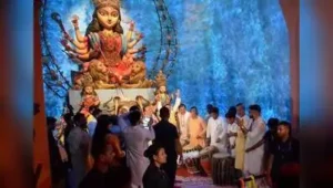 CM Suvendu Adhikari plays dhak at the Allen Park puja pandal