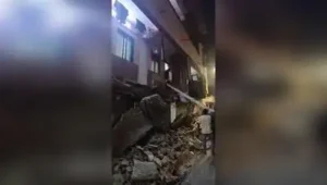 A portion of the external slab of the B wing of Devki Apartment, a 46-year-old building