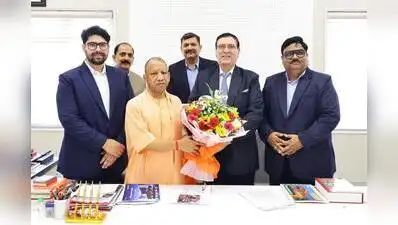 Members of the Hinduja group with CM Yogi Adityanath