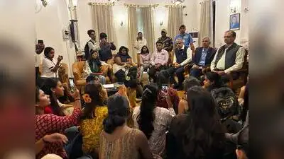 SPPU girls' hostel boarders speak to varsity officials following a protest on moral policing