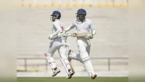Vidarbha's captain Akshay Wadkar and Yash Rathod run between the wickets during the Ranji