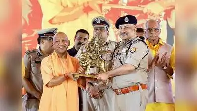 DGP Rajeev Krishna felicitates State Chief Minister Yogi Adityanath during an event organised