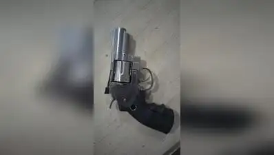 Liquor trader held for brandishing unlicenced revolver at bar