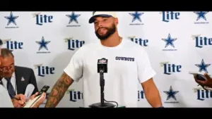 receives his ass out of here,” Prescott said as he pointed out the person