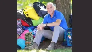 Rob Scheer began packing backpacks at home after seeing his newly adopted foster children
