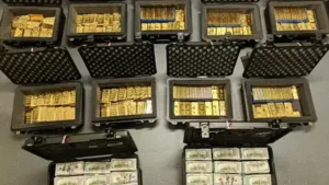 Federal executive created fake program, diverted $145M; FBI found 298 gold bars in $193.6M
