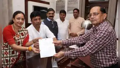UPCC chief Aradhana Misra Mona hands over the charge to Virendra Chaudhary on Friday