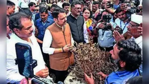 Maharashtra Chief Minister Devendra Fadnavis during an inspection of areas affected by drought