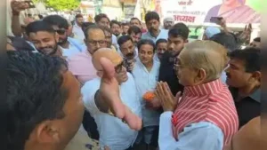 When Rai arrived, his supporters asked us to move aside, and I was helping women make way