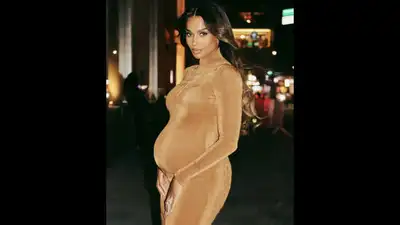 Because of her growing baby bump, but also because of the eye-catching diamond ring she