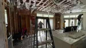 In 2021, a Dallas home's flooring was damaged after a neighbour's frozen pipes burst; the insurer