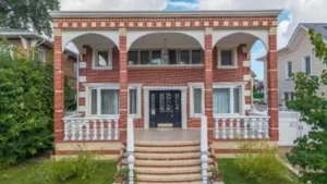 In 2003, two brothers bought a Queens home for $850,000; after racketeering convictions and years