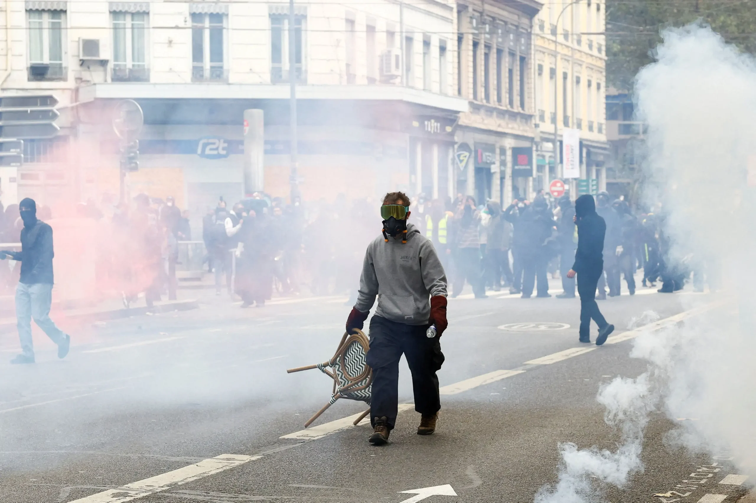 Anti-establishment demonstrations turned violent in France and Spain on Saturday