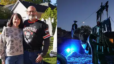 A Michigan father and his family have added a pirate ship to their front-yard Halloween world