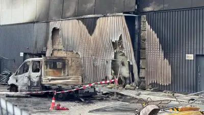 A 41-year-old Romanian neighbour of the three Indian students killed in a fire in west Germany