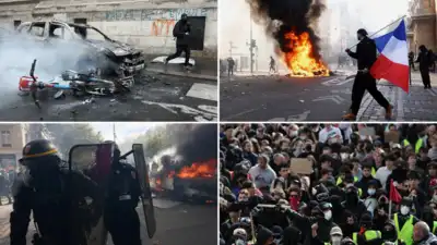 Milan police clashed Sunday with protesters throwing stones and looting shops during protests