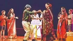 Portions of the play capture the small-town charm of Ramnagar, especially the scene when guests