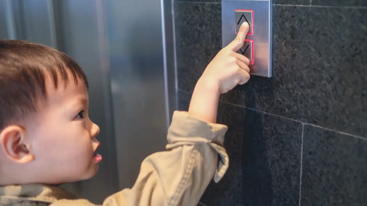 A child’s insistence on pressing the lift button may be about autonomy, not just getting a turn