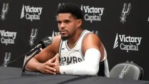 Coach Mitch Johnson told reporters Sunday that the Spurs will let a left calf strain heal