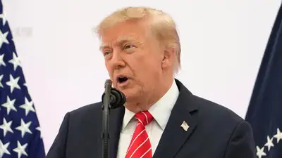 US President Donald Trump speaks to reporters as he weighs joining Saudi Arabia’s strikes