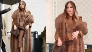 Jennifer Lopez arrived at Paris Fashion Week in the rain, but that clearly wasn’t going to stop