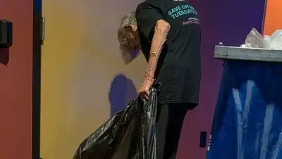 A 21-year-old Tennessee moviegoer noticed an 80-year-old AMC usher emptying trash after a screening