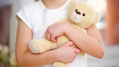 A child who carries the same toy from room to room may simply enjoy playing with it