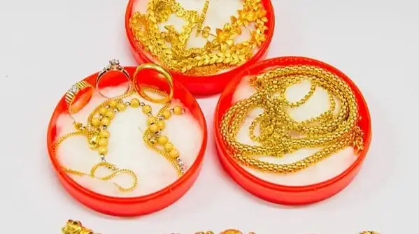 Your everyday gold chain and earrings do a lot of quiet work