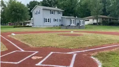An Ohio boy asked his dad for a baseball field in their backyard; two years and about $30,000